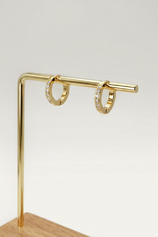     Radiant Pavé Huggie Hoops waterproof gold earrings with zircon stones