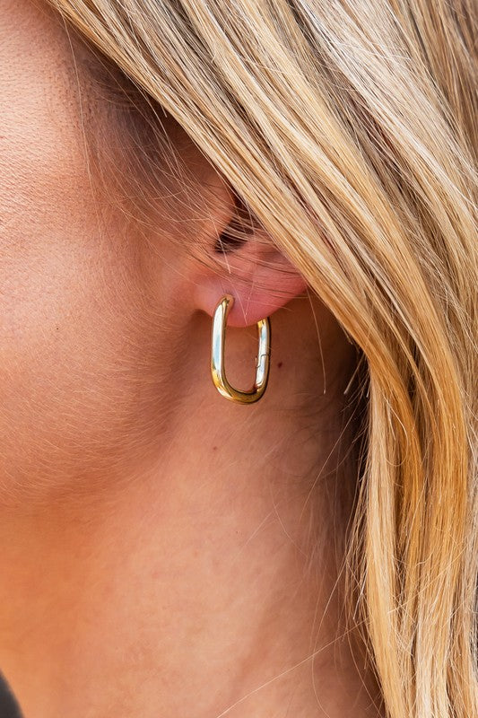 Minimalist gold huggie hoops – perfect for everyday wear