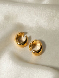 Close-up of stainless steel Cuff Joy C-shape ear cuff earrings