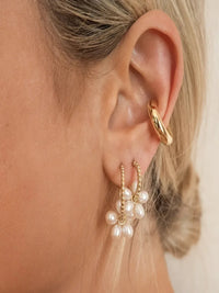 Model wearing Cuff Joy stainless steel clip-on C-shape earrings
